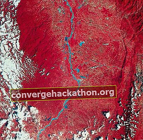Image d'une partie de la vallée de la rivière Magdalena en Colombie, transmise par Landsat (anciennement ERTS) 2 le 7 janvier 1977. Le vert, le rouge et l'infrarouge sont enregistrés séparément par le satellite, puis combinés pour former l'image. La végétation apparaît en rouge et les terres stériles sont vertes. La rivière Magdalena et les lacs voisins sont bleus; les taches blanches sont des nuages. Le motif nord-sud à peu près parallèle le long du centre droit indique des affleurements rocheux où les roches ont été pliées en une structure pliée.